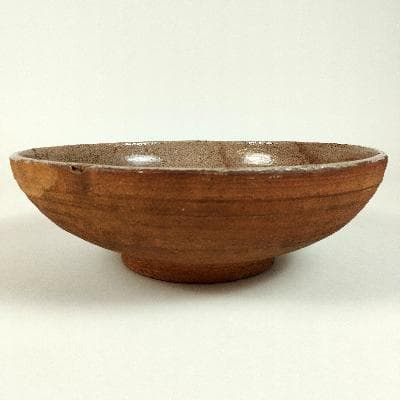 Ariel Ortega. Plato en cerámica de alta temperatura color beige y naranja