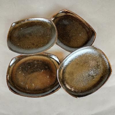 Alberto Díaz de Cossío. Juego de 4 platos en cerámica de alta temperatura café