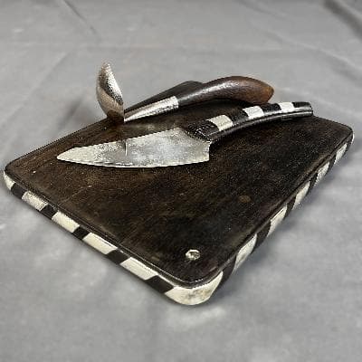 William Spratling. Tabla para quesos con cuchillo y cuchara salsera en palo de rosa y plata .925