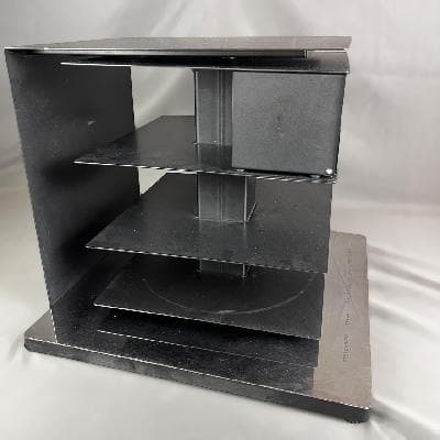 Bruno Rainaldi para Opinion Ciatti. Mesa lateral / de centro / librero PtolomeoX4 Short en acero laqueado negro y cromado