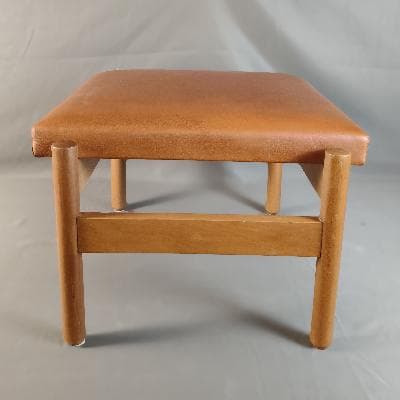 Taburete estilo Danés con piel naranja